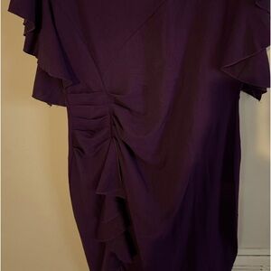 Purple dress with ruffles on right side of dress